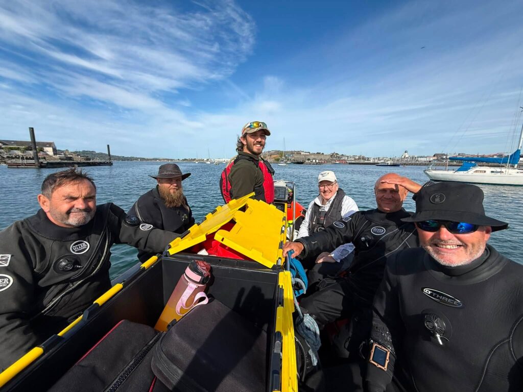 May be an image of kayak and text